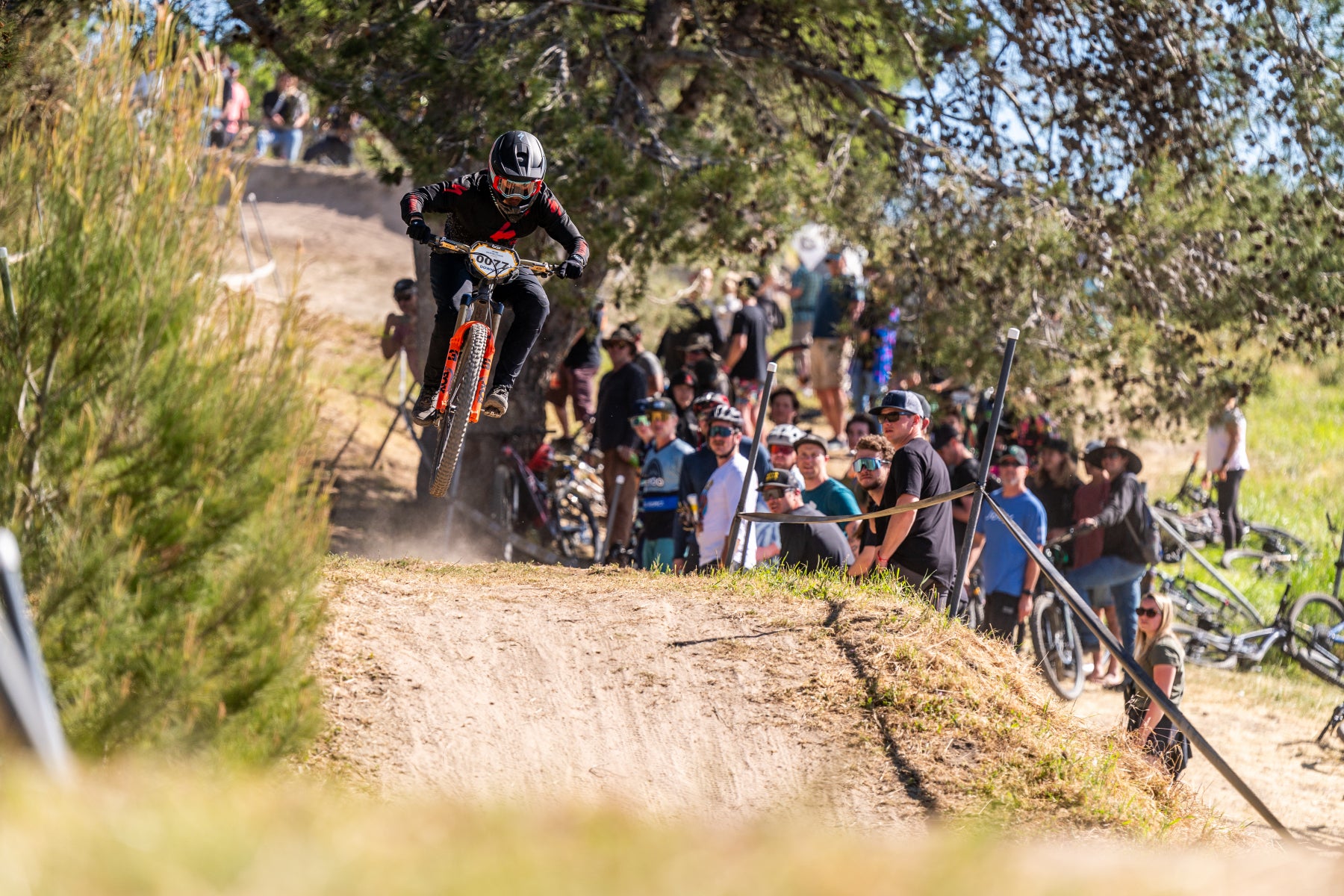 Mountain bike racer descending at the Sea Otter Classic
